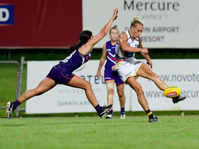 Adelaide Crows' co-captain Erin Phillips fires off a kick inside-50 during the team’s trial game against the Fremantle Dockers in Darwin on January 19, 2019. Picture: Justin Kennedy