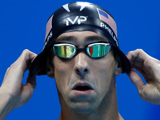 RIO DE JANEIRO, BRAZIL - AUGUST 12: Michael Phelps of the United States prepares to compete in the Men's 100m Butterfly Final on Day 7 of the Rio 2016 Olympic Games at the Olympic Aquatics Stadium on August 12, 2016 in Rio de Janeiro, Brazil. (Photo by Clive Rose/Getty Images)
