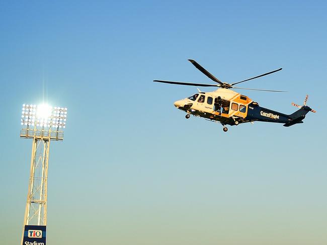 A Careflight rescue helicopter landed in TIO field to drop off the official footy ahead of Saturday's NRL game where the Parramatta Eels faced the North Queensland Cowboys.Picture: Justin Kennedy