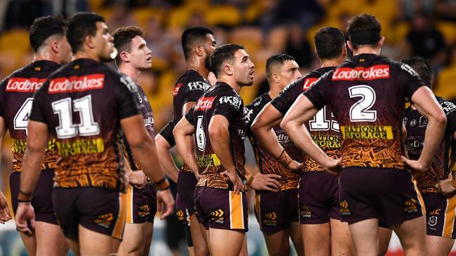 Dejected Brisbane players after the Panthers edged further ahead. Picture: Albert Perez/Getty