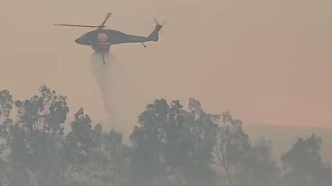 Smoke blankets Melbourne as bushfires burn out of control