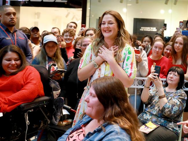 Barrymore meeds some of her adoring fans at Westfield Parramatta for the Australian launch of her makeup range, Flower Beauty. (AAP IMAGE / Angelo Velardo)