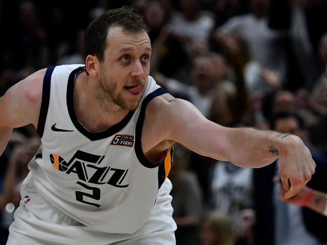 SALT LAKE CITY, UT - OCTOBER 19: Joe Ingles #2 of the Utah Jazz reacts to his three point basket in the second half of a NBA game against the Golden State Warriors at Vivint Smart Home Arena on October 19, 2018 in Salt Lake City, Utah. NOTE TO USER: User expressly acknowledges and agrees that, by downloading and or using this photograph, User is consenting to the terms and conditions of the Getty Images License Agreement. (Photo by Gene Sweeney Jr./Getty Images)