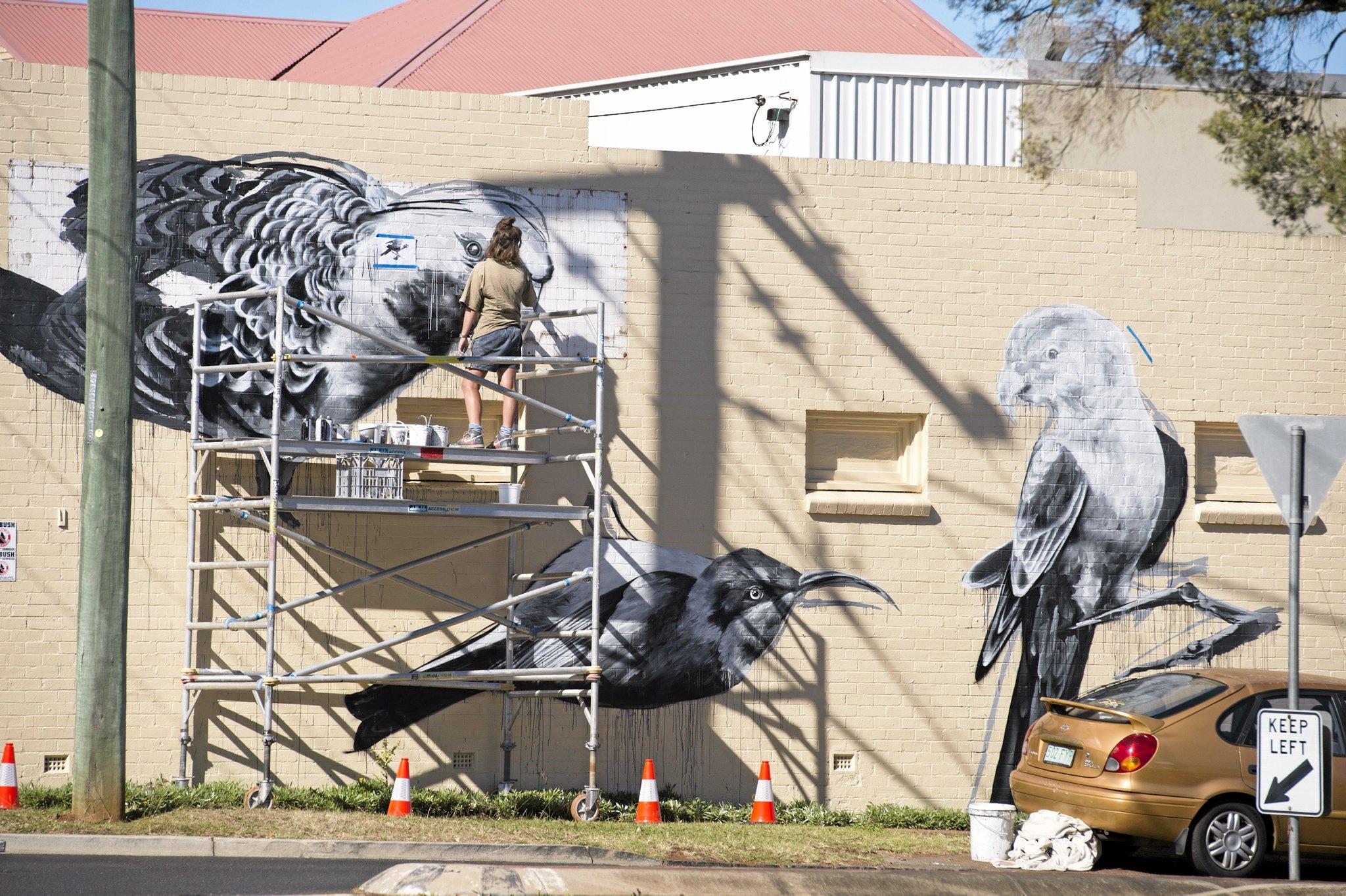 Noke at work on her First Coat wall of corner of Neil and Campbell Sts, Monday, May 30, 2016. Picture: Kevin Farmer