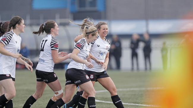 Hobart Zebras’ Danielle Kannegiesser, right, celebrates opening the scoring in the Statewide Cup final. Picture: PATRICK GEE