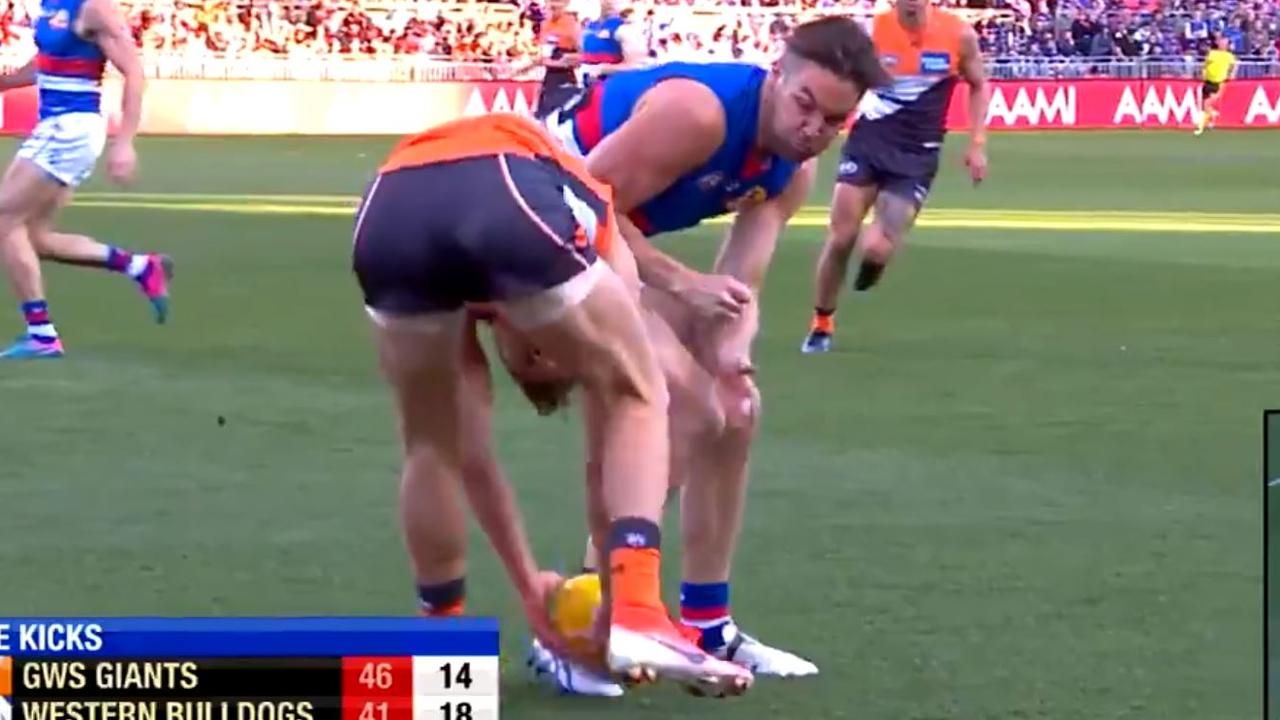 Matt Suckling bumps GWS star Josh Kelly.