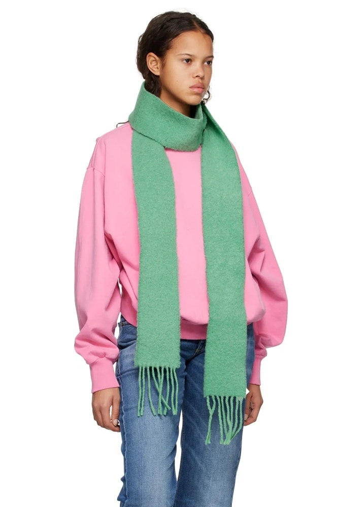 <h3><a href="https://www.ssense.com/en-au/women/designers/acne-studios" target="_blank" rel="nofollow noopener"><b>Acne Studios</b></a></h3><p>’Tis the season of the scarf, an accessory we welcome with open arms. This year, we’re styling the scarf the way the Scandis do it: long enough so you can wrap it every which way around the head. This design from Acne Studios is the perfect starting point—not too oversized, but also not too skinny (even though that is, according to the Scandis again, bang on trend).</p><p><b>Category: </b>Accessories | <b>Material:</b> Alpaca, wool, nylon |<b> Colour(s): </b>Green, pink | <b>Delivery: </b>$40 shipping</p><p><b>SHOP NOW: </b>Acne Studios green fringed scarf, $290 from <a href="https://www.ssense.com/en-au/women/product/acne-studios/green-fringed-scarf/12269021" target="_blank" rel="nofollow noopener"><b>Ssense</b></a></p>