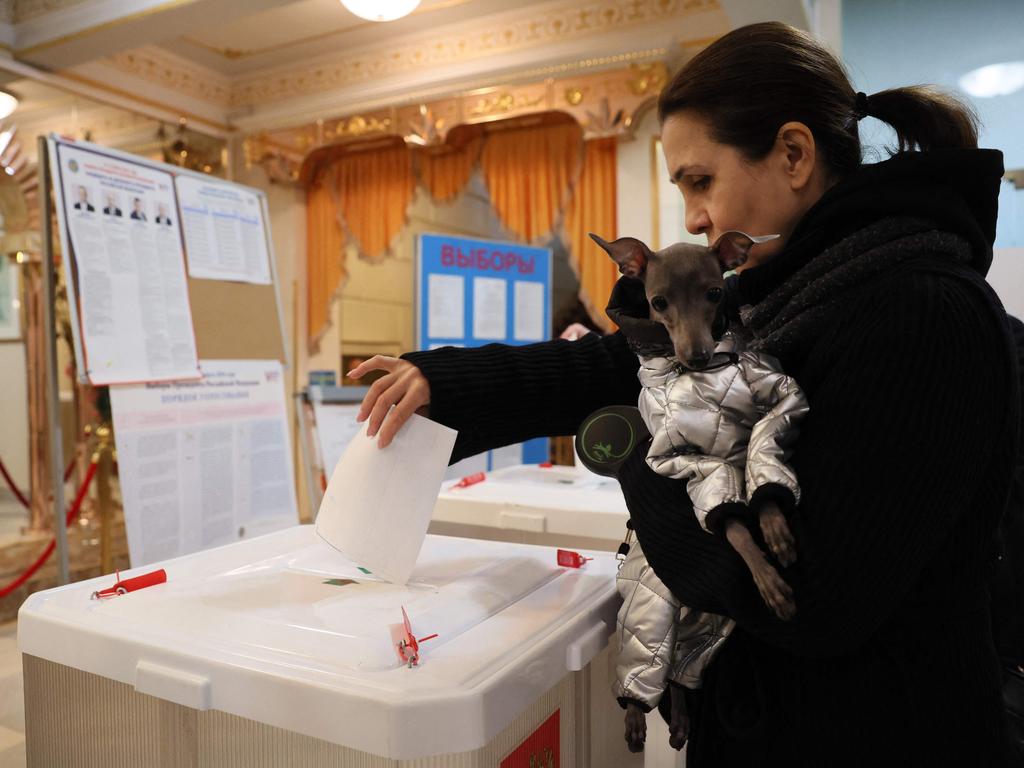 A woman casts her ballot in Moscow. Picture: AFP