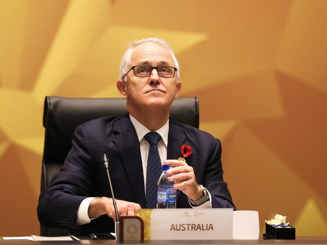 Prime Minister Malcolm Turnbull, pictured during the leaders' retreat at the APEC summit in Vietnam, said Mr Alexander had “done the right thing”.