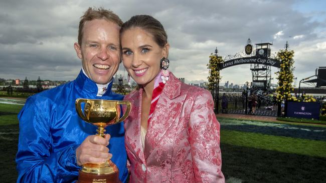 Winning jockey Kerrin McEvoy and his wife Cathy with the Melbourne Cup. Picture: Jay Town