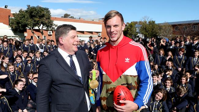 Looking back: Olympic Gold medallist Kyle Chalmers returns to his school Immanuel College after returning from Rio and is pictured here with school principal Kevin Richardson. Picture: Calum Robertson