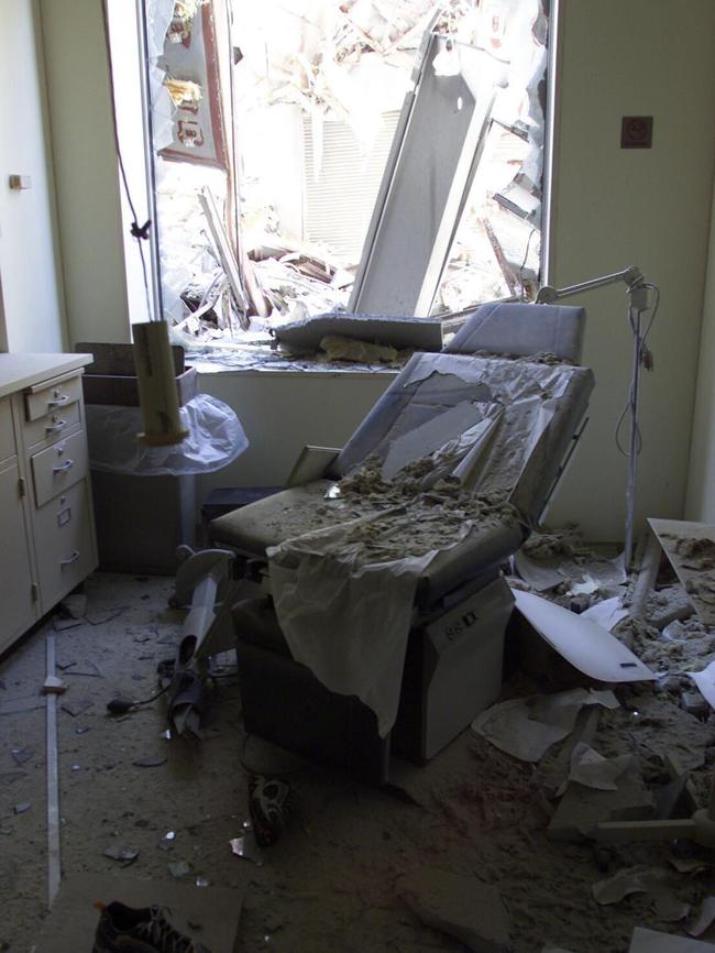 Debris is seen in a dentist's office on a block opposite New York's WTC five days after the attack. Picture: Steve Wood