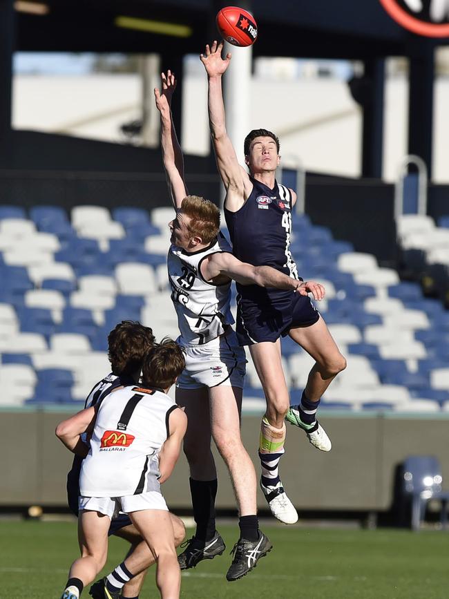 Geelong Falcons’ Henry Walsh (right) already stands 202cm tall. Picture: Alan Barber