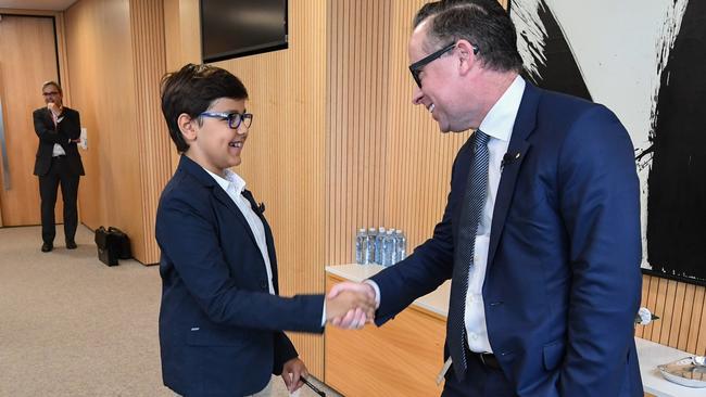 Alan Joyce shakes on his deal with Alex Jacquot.