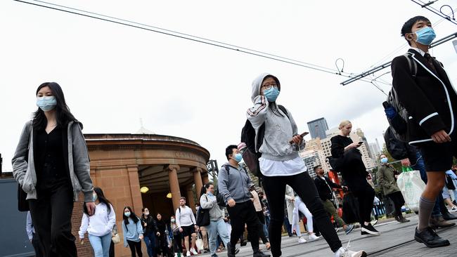 Public transport commuters are still wearing masks as an extra precaution in Sydney. Picture: NCA NewsWire/Bianca De Marchi