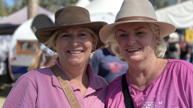 Vicky Dunford and Wendy Carey, from Gympie and Beerwah, enjoy day one of the 2024 Gympie Muster, at the Amamoor State Forest on August 22, 2024.