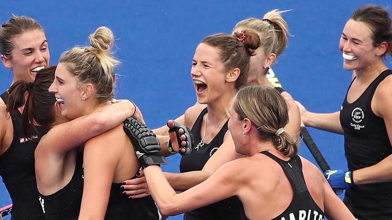 Olivia Merry of New Zealand is congratulated by her teammates after scoring her teams third goal against Australia. (Photo by Scott Barbour/Getty Images)