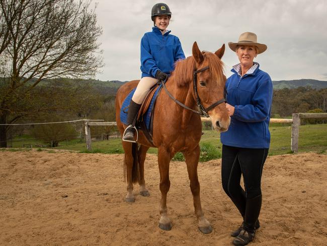 Riding instructor Rachele Taylor with present day student Matilda Hill 10, on Tarnish at the Templewood Horse Riding Centre at Inglewood in the Adelaide Hills. Picture: Brad Fleet