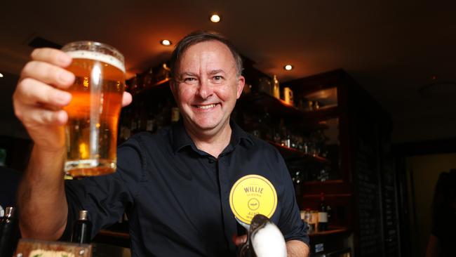 Mr Albanese pours himself a pot of Willie the Boatman Albo Pale Ale.