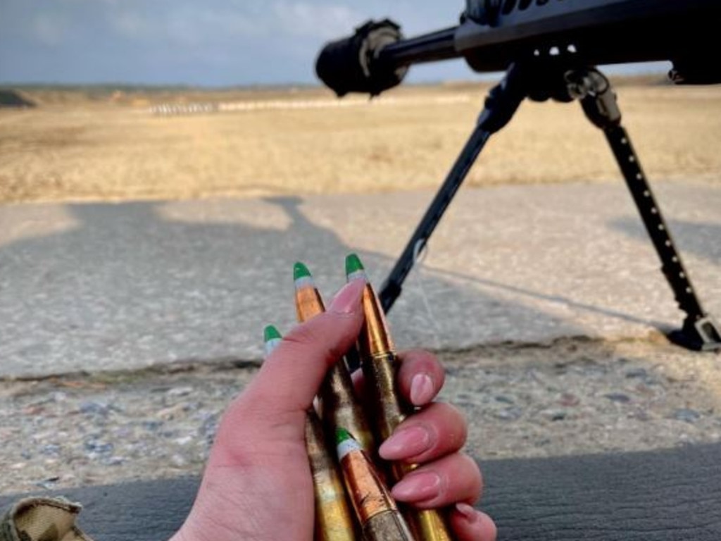 One female soldier holds ammunition casings in her manicured hand. Picture: Instagram/@_krii_13/