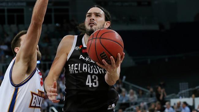 Chris Goulding drives to the basket early in the clash. Picture: George Salpigtidis