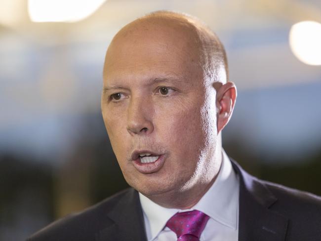 Minister for Home Affairs Peter Dutton is seen at the Pine River Bowls Club in Bray Park, Brisbane, Tuesday, April 16, 2019. (AAP Image/Glenn Hunt) NO ARCHIVING