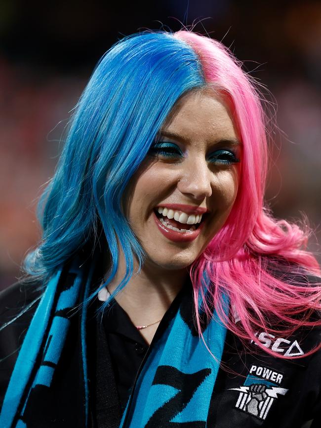 A Power fan cheering on Port: Picture: Michael Willson/AFL Photos via Getty Images)