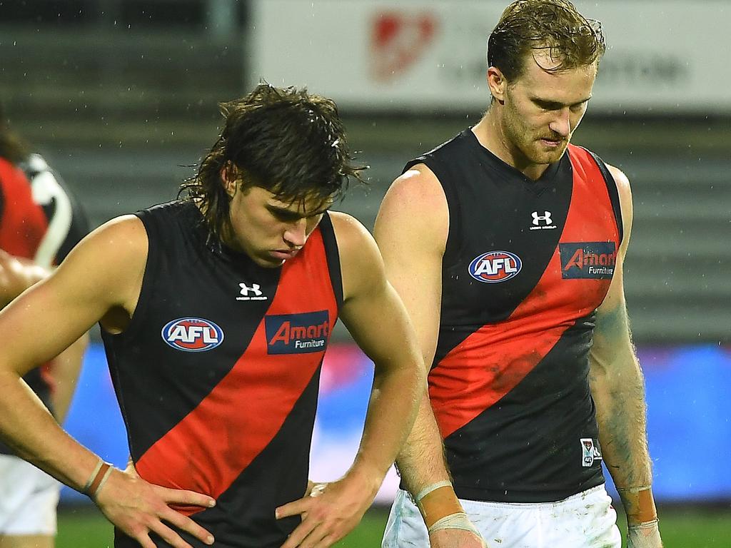 LAUNCESTON, AUSTRALIA - AUGUST 29: Sam Durham and James Stewart of the Bombers look dejected after losing the AFL First Elimination Final match between Western Bulldogs and Essendon Bombers at University of Tasmania Stadium on August 29, 2021 in Launceston, Australia. (Photo by Steve Bell/AFL Photos/via Getty Images)