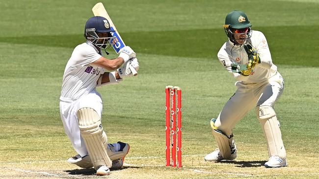 Ajinkya Rahane bats India to victory at the MCG on Tuesday as Australian captain Tim Paine watches on. Picture: Getty Images