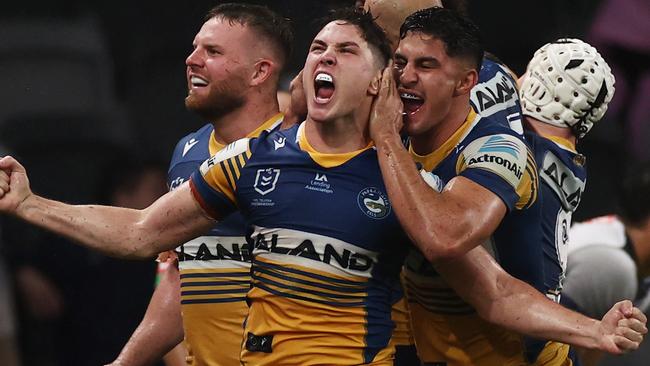 SYDNEY, AUSTRALIA – MARCH 18: Mitchell Moses of the Eels celebrates after Maika Sivo of the Eels scores a try during the round two NRL match between the Parramatta Eels and the Melbourne Storm at Bankwest Stadium on March 18, 2021, in Sydney, Australia. (Photo by Cameron Spencer/Getty Images)