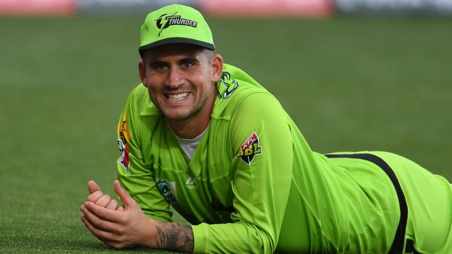 HOBART, AUSTRALIA - JANUARY 24: Alex Hales of the Thunder reacts after failing to stop a boundary during the Big Bash League match between the Hobart Hurricanes and the Sydney Thunder at Blundstone Arena on January 24, 2020 in Hobart, Australia. (Photo by Steve Bell/Getty Images)