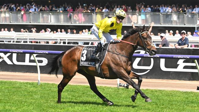 MELBOURNE, AUSTRALIA - NOVEMBER 07: Mark Zahra riding Without A Fight winning Race 7, the Lexus Melbourne Cup,  during Melbourne Cup Day at Flemington Racecourse on November 07, 2023 in Melbourne, Australia. (Photo by Vince Caligiuri/Getty Images)