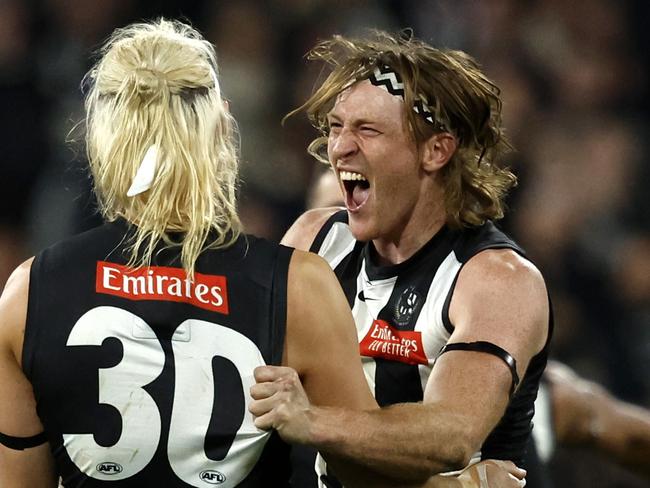 Collingwood's Darcy Moore and Nathan Murphy react on the final siren during the AFL Preliminary Final match between the GWS Giants and Collingwood Magpies at the MCG on September 22, 2023.  Photo by Phil Hillyard(Image Supplied for Editorial Use only - **NO ON SALES** - Â©Phil Hillyard )