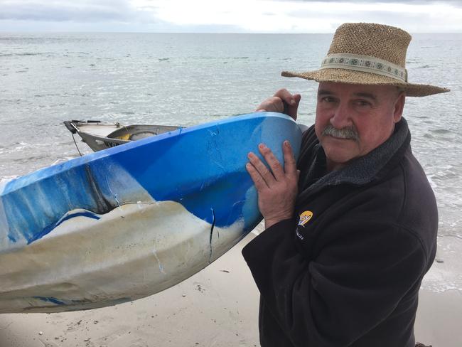 Shark knocks terrified 15-year-old girl out of her kayak in