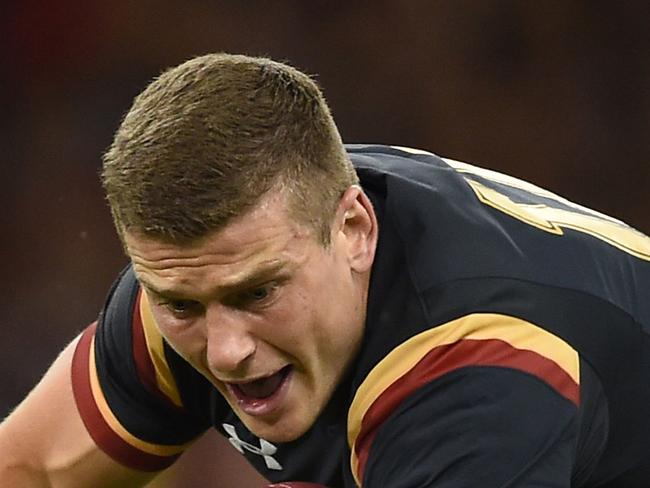 Wales' Scott Williams, left, is tackled by Italy's Leonardo Sarto during the rugby union World Cup warm up match at the Millennium Stadium, Cardiff, Wales Saturday Sept. 5, 2015. (Joe Giddens/PA Wire via AP) UNITED KINGDOM OUT, NO SALES, NO ARCHIVE