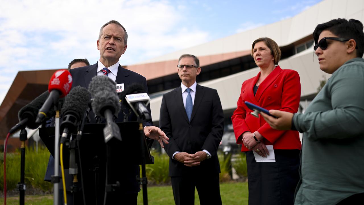 Bill Shorten was speaking to the media outside Casey Hospital when Rob came up to speak to him. Picture: AAP