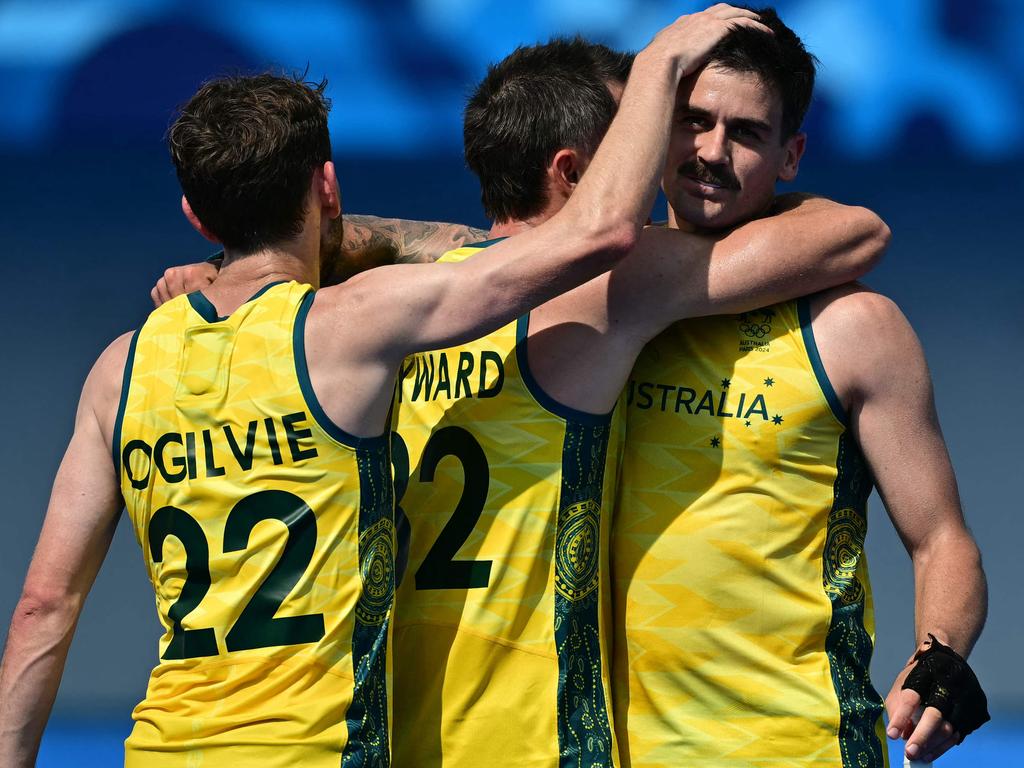 Australia's forward Blake Govers celebrates with teammates after scoring his team's fifth goal, sealing the 5-0 victory against New Zealand. Picture: Miguel Medina/AFP