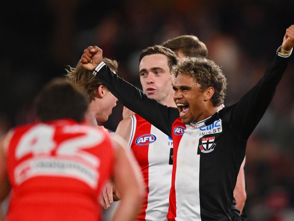 Liam Henry celebrates the win on the final siren/ Picture: Morgan Hancock/AFL Photos/via Getty Images.