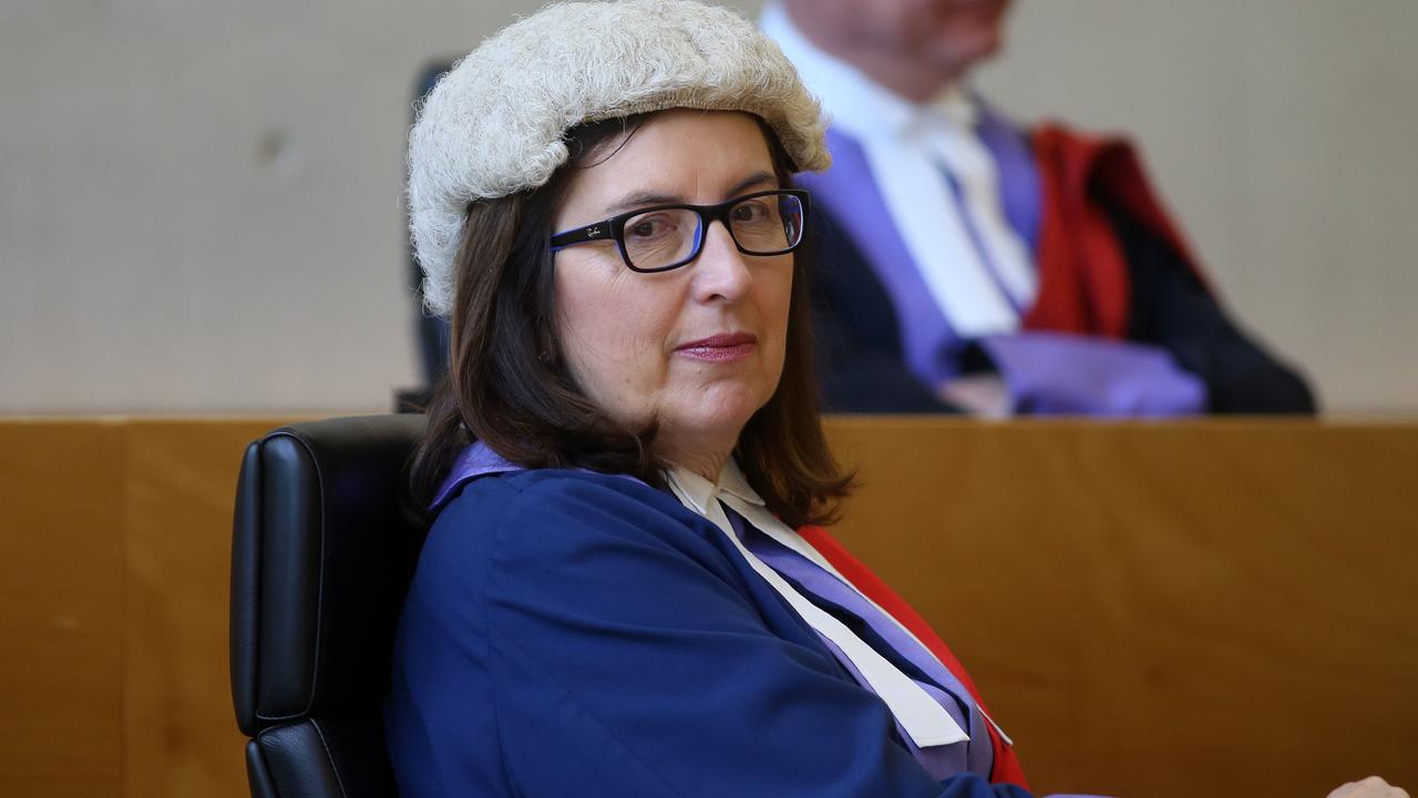 Judge Deborah Richards said unchecked misogyny, sexism and racism, coupled with under resourcing, affected the QPS response to domestic and family violence.