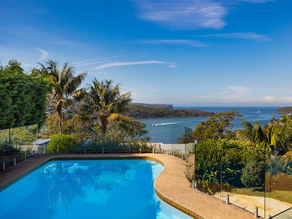 The home includes sweeping coastal views.