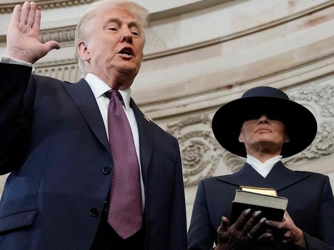 Inscrutable. Melania Trump kept her eyes covered as her husband was sworn in as the 47th president of the United States. Picture: AFP