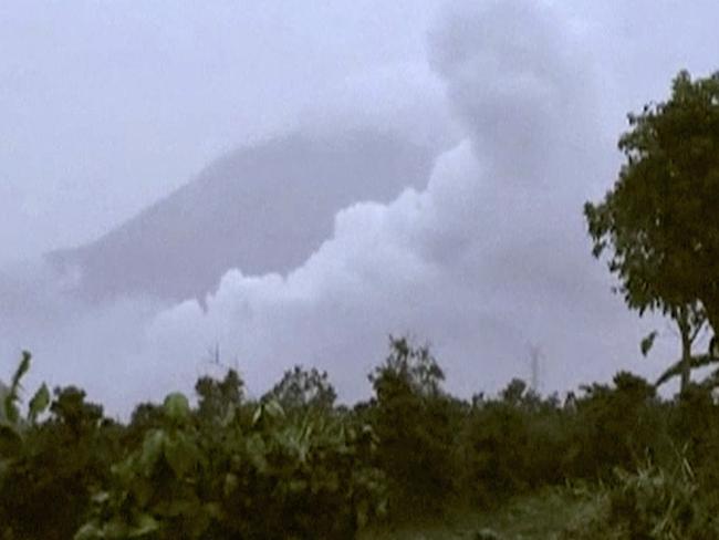 Hot clouds of ash rise from Mount Sinabung, in Tanah Karo, North Sumatra, Indonesia.  Picture:  AP