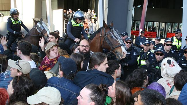 Mounted police attempt to control protesters today. Picture: AAP