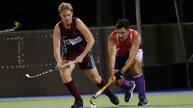 Cairns Hockey Association trial game between Brothers and Stingers. Brothers’ Cade Coghlan and Stingers’ Scott Sparkes. PICTURE: STEWART McLEAN