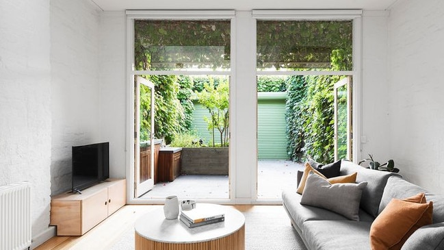 Light-filled living area, with soaring high ceilings.