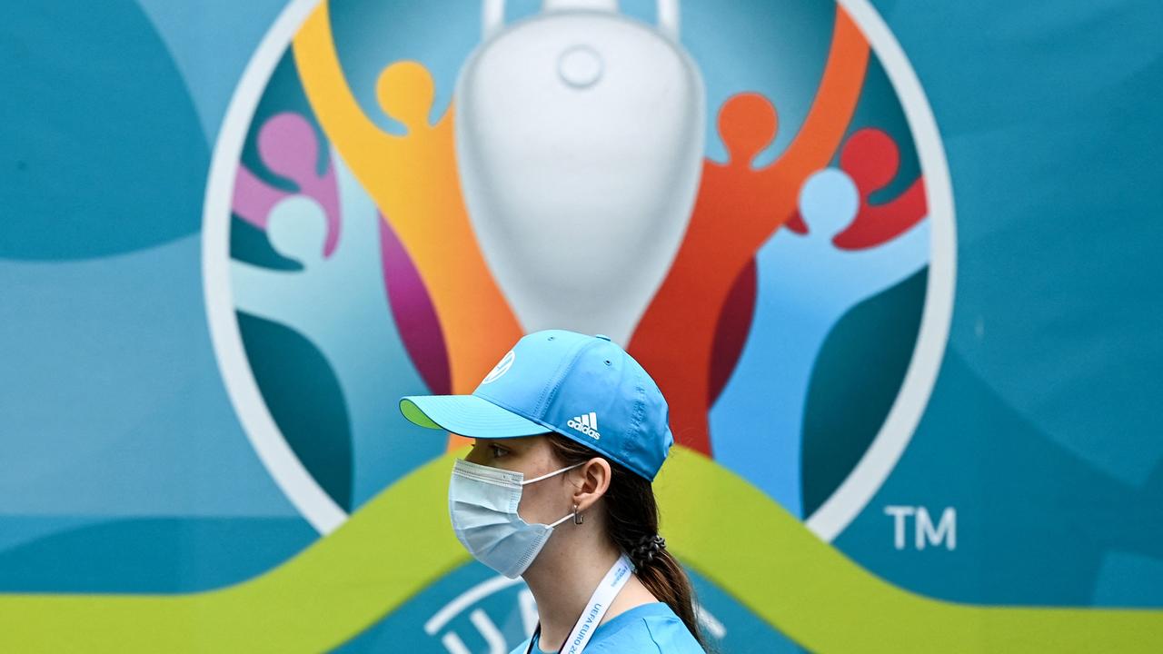 A Euro 2020 volunteer wears a face mask in St Petersburg, Russia. Picture: Kirill Kudryavtsev/AFP