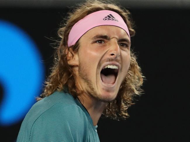 Stefanos Tsitsipas of Greece celebrates after defeating Nikoloz Basilashvili of Georgia in the match on day five of the Australian Open tennis tournament in Melbourne, Friday, January 18, 2019. (AAP Image/David Crosling) NO ARCHIVING, EDITORIAL USE ONLY