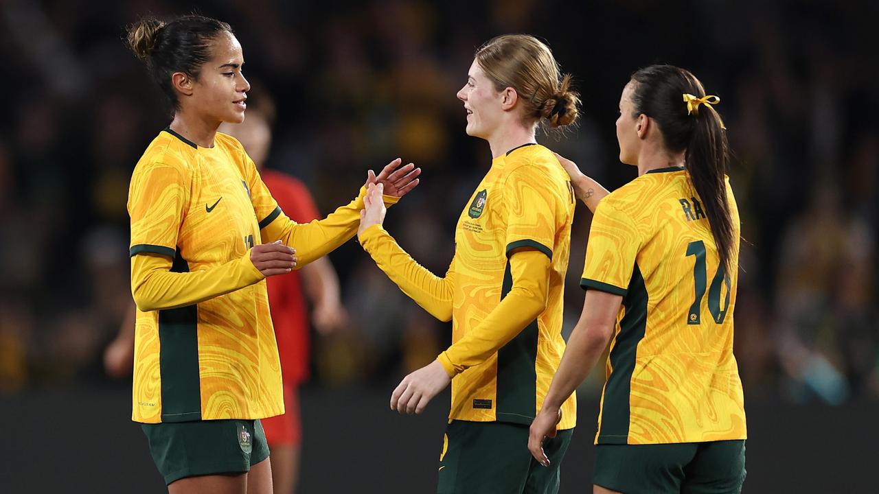 Mary Fowler (left) and Hayley Raso (right) will make their second Olympic appearance in Paris, while Cortnee Vine (centre) will make her Games debut. (Photo by Cameron Spencer/Getty Images)