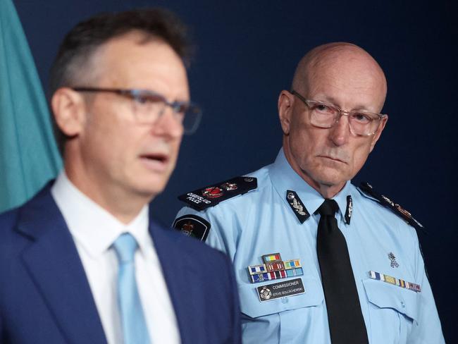 Queensland Human Rights Commissioner Scott McDougall and Queensland Police Commissioner Steve Gollschewski during a media conference at Police HQ in Brisbane on Tuesday. Picture: Liam Kidston.