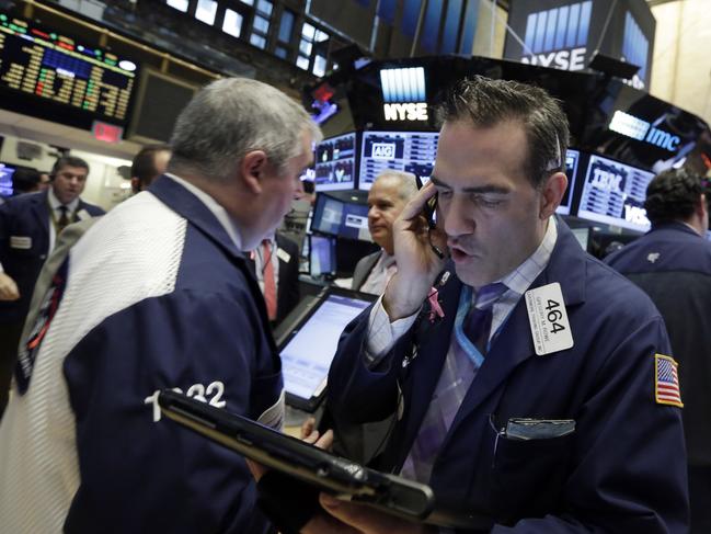 Trader Gregory Rowe works on the floor of the New York Stock Exchange, Wednesday, Nov. 25, 2015. Stocks are drifting higher in early trading as markets start to wind down ahead of the Thanksgiving holiday in the U.S. (AP Photo/Richard Drew)